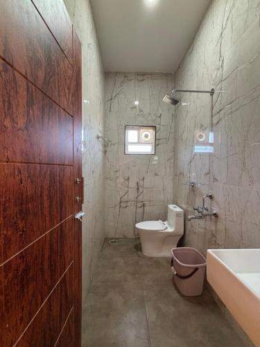 Koupelna v ubytování Hotel Saesha International