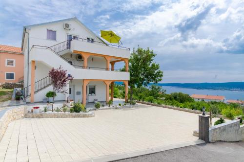 a villa with a view of the sea at Apartments Lujić in Crikvenica