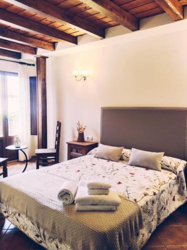 Katil atau katil-katil dalam bilik di Hostal El Rincón del Trillo