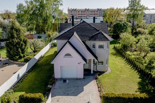 an overhead view of a small white house at Luxury Villa in Pärnu, walking distance from the beach and city centre in Pärnu