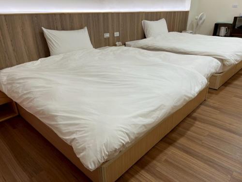 Postel nebo postele na pokoji v ubytování Yunshanjian B&B