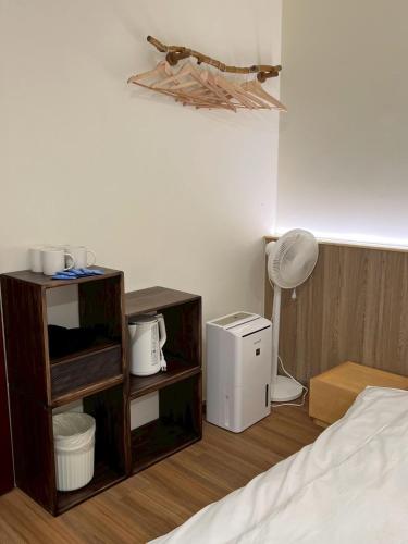 Una cama o camas en una habitación de Yunshanjian B&B