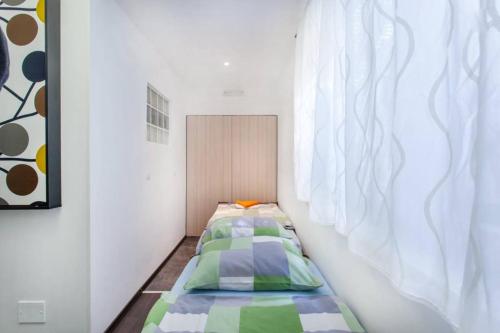 Een bed of bedden in een kamer bij Apartment Center 25