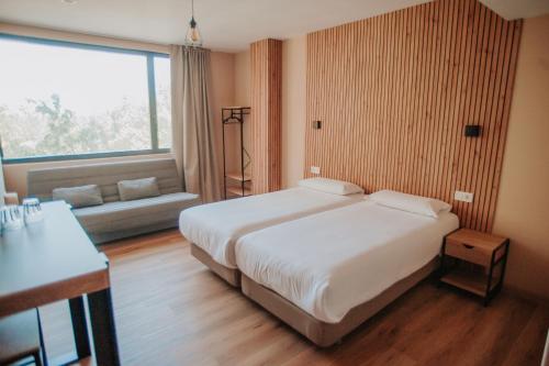 Postel nebo postele na pokoji v ubytování Polotel