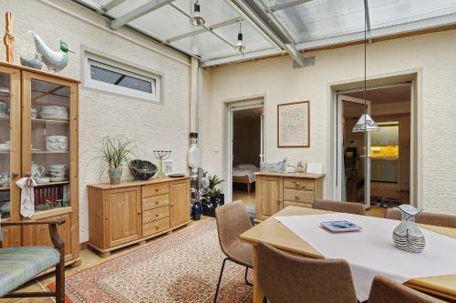 a living room with a table and chairs at Ferienwohnung Ihmert in Hemer
