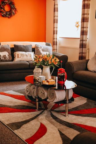 Χώρος καθιστικού στο Sunnyside farmstay & hottub near Brecon Beacons sleeps 8