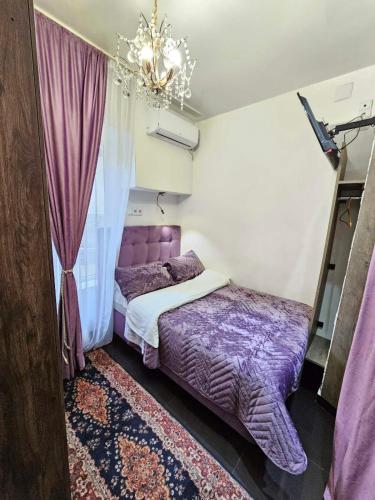 Postel nebo postele na pokoji v ubytování Bella Donna Hotel