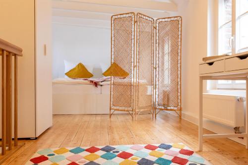 a room with a large metal gate in a room at Urlaub im historischen Torschreiberhaus in Xanten