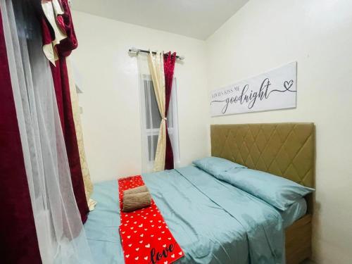 Postel nebo postele na pokoji v ubytování Staycation House in Dauis, Panglao