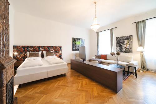 Postel nebo postele na pokoji v ubytování GH Luxury Apartments Graz, Gösser Haus