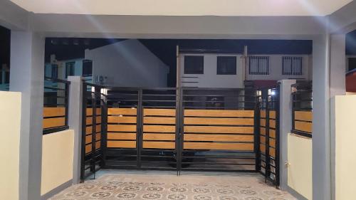 a view from the inside of a stable with a gate at Vacation Home in Naga City -Jacobes Place in San Felipe