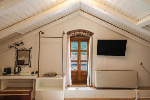 TV a/nebo společenská místnost v ubytování Authentic Suites in Fiscardo (Archontiko)