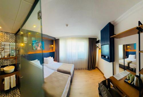 Кровать или кровати в номере Casativo Hotel
