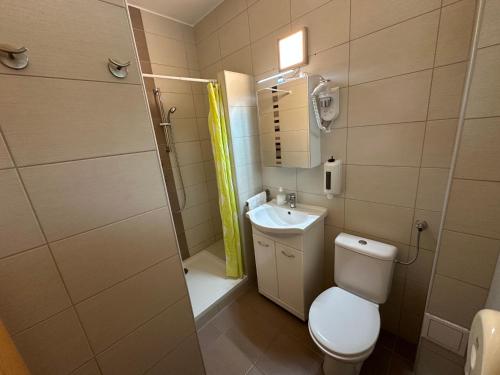 Koupelna v ubytování Siesta Club Apartman Harkány