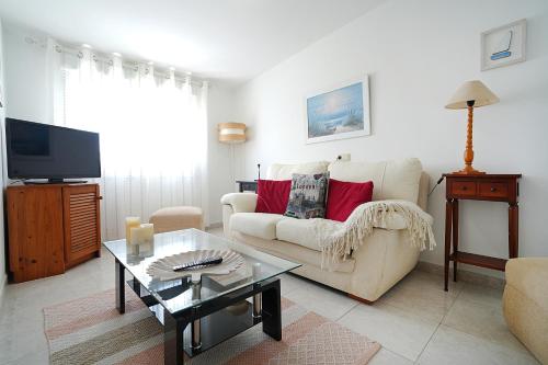 Et tv og/eller underholdning på Apartamento cerca del Paseo Marítimo de O Grove