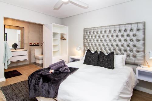 Ένα ή περισσότερα κρεβάτια σε δωμάτιο στο Vygeboom Villa/ Durbanville