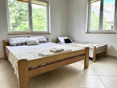 Postel nebo postele na pokoji v ubytování Anit Rooms