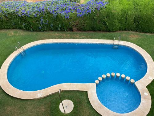 The swimming pool at or close to Lovely flat with sea view near the beach by Costarentals - Ref 37