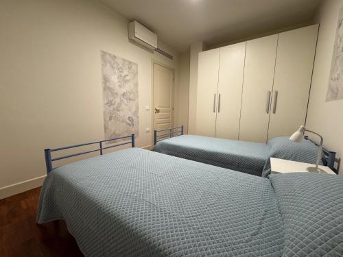 Ένα ή περισσότερα κρεβάτια σε δωμάτιο στο Incanto Apartment