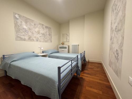 Ένα ή περισσότερα κρεβάτια σε δωμάτιο στο Incanto Apartment