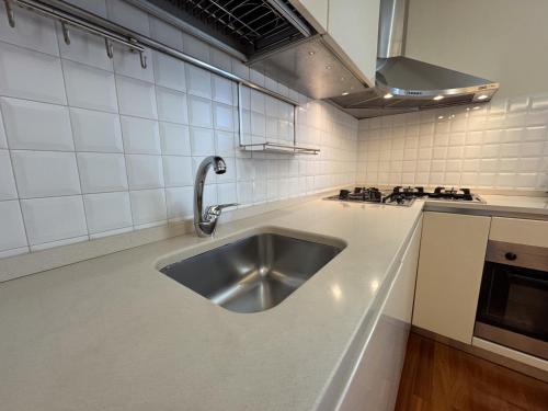 Η κουζίνα ή μικρή κουζίνα στο Incanto Apartment