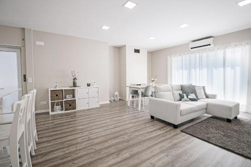 a living room with a couch and a table at Casa Foros de Amora in Amora