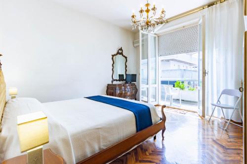 Ένα ή περισσότερα κρεβάτια σε δωμάτιο στο Appartamento D'Annunzio - MyHo Casa