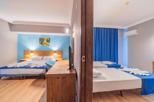 Postel nebo postele na pokoji v ubytování Pyxis Point Hotel - All Inclusive