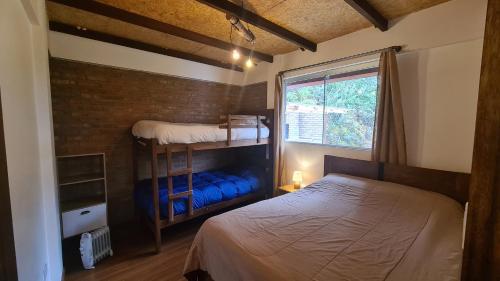 Postel nebo postele na pokoji v ubytování Cabañas Mirador Rakhem