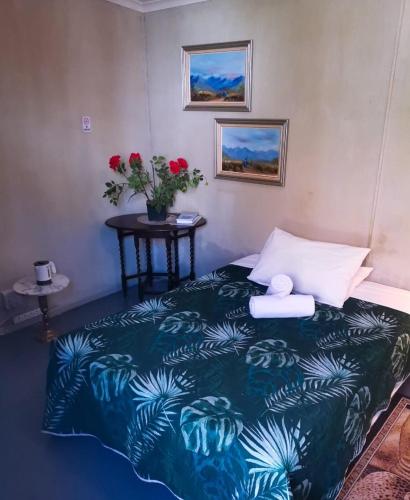 Ένα ή περισσότερα κρεβάτια σε δωμάτιο στο Cathys Guesthouse 1
