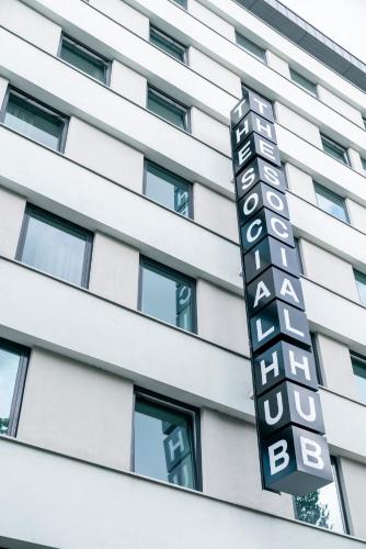 a hotel sign on the side of a building at The Social Hub Rotterdam Extended Stay in Rotterdam