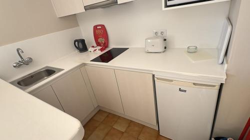 Η κουζίνα ή μικρή κουζίνα στο Apartamento Siestamar