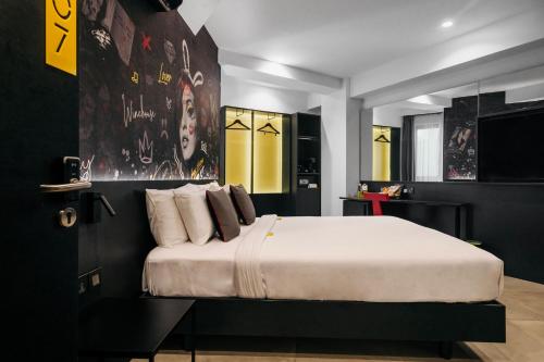 Postel nebo postele na pokoji v ubytování SO City Hotel Adults Only