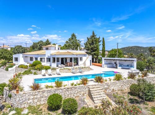 an image of a villa with a swimming pool at Private Oasis in Algarve with Pool & Fruit Garden in Loulé