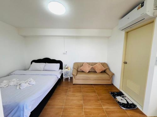 Postel nebo postele na pokoji v ubytování The View Homestay Monjam เดอะวิว โฮมสเตย์ม่อนแจ่ม