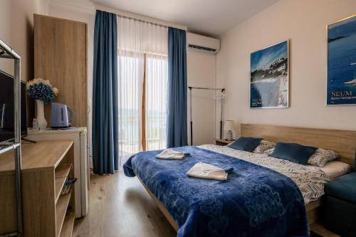 Postel nebo postele na pokoji v ubytování Rooms Bačić