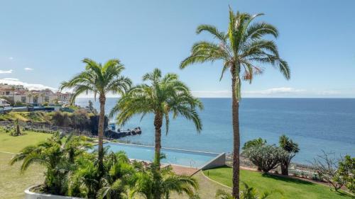 a view of the ocean from a resort at Suite 5P Madeira Acqua Residence in Funchal