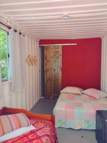 Postel nebo postele na pokoji v ubytování A Casa Raiz Containers