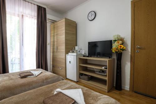 TV a/nebo společenská místnost v ubytování Rooms Bačić