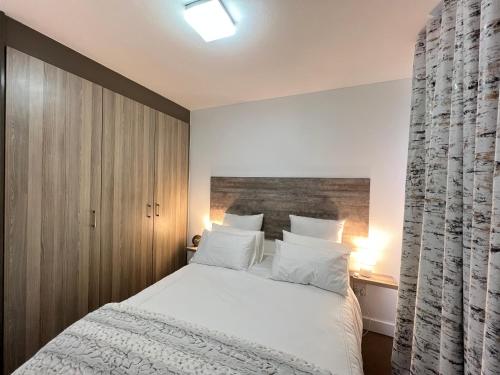 Postel nebo postele na pokoji v ubytování Happy Nest
