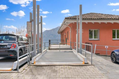 a car parked on a ramp next to a building at Casa Camelia App 5055 in Contra