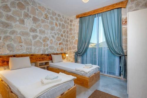 Ένα ή περισσότερα κρεβάτια σε δωμάτιο στο Villa Furreyya2