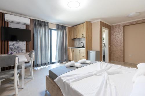 Postel nebo postele na pokoji v ubytování Hotel Apart Resilient