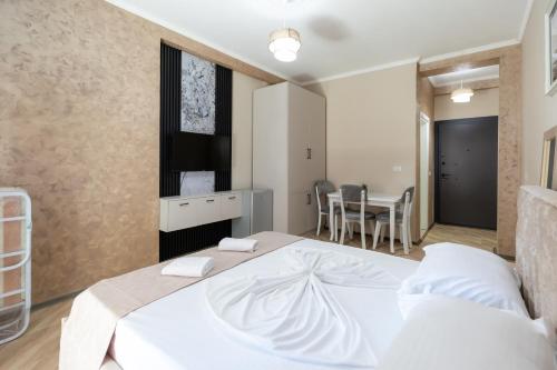 Postel nebo postele na pokoji v ubytování Hotel Apart Resilient