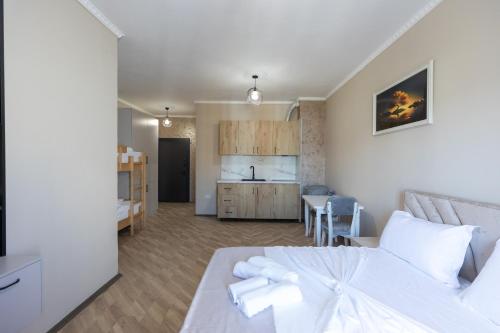 Kuchyň nebo kuchyňský kout v ubytování Hotel Apart Resilient
