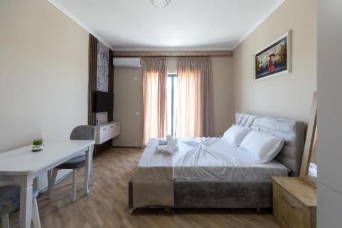 Postel nebo postele na pokoji v ubytování Hotel Apart Resilient