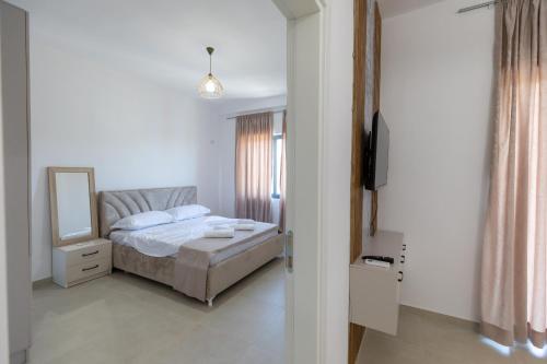 Postel nebo postele na pokoji v ubytování Hotel Apart Resilient