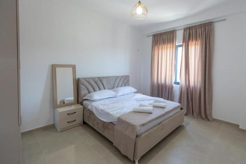 Postel nebo postele na pokoji v ubytování Hotel Apart Resilient