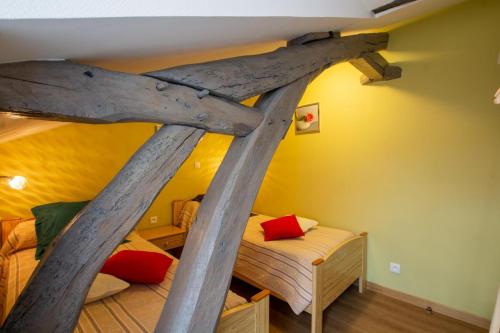 Cama o camas de una habitación en Moulin neuf de combecave