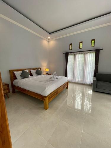 Katil atau katil-katil dalam bilik di nyoman sekumpul house